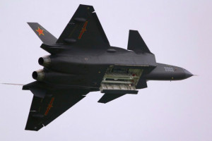 J-20 doing a fly-past showing off its internal weapons bay. 
