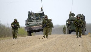 Members from 5 Canadian Mechanized Brigade Group dismount and conduct mine clearance drills in the training area of 3rd Canadian Division Support Group, Wainwright, AB during the main thrust of the advance party for Exercise MAPLE RESOLVE 15, 6 May 15. Photo by: Sgt Dan Shouinard