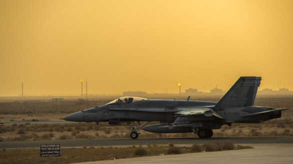 A CF-18 Hornet taxis on the runway before a night patrol during Operation IMPACT in Kuwait, on February 1, 2015. Photo: Canadian Forces Combat Camera, DND