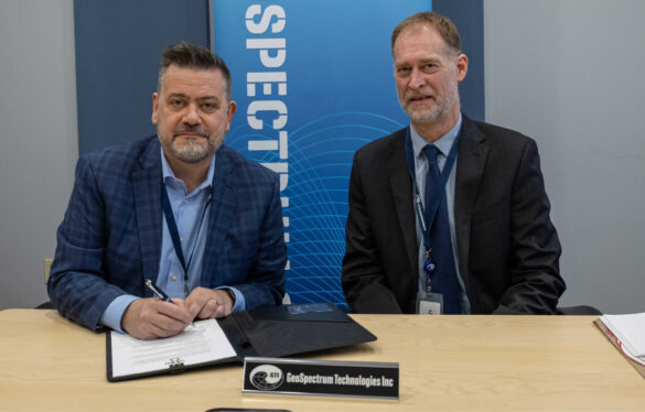 Team Vigilance signing at GeoSpectrum Technologies