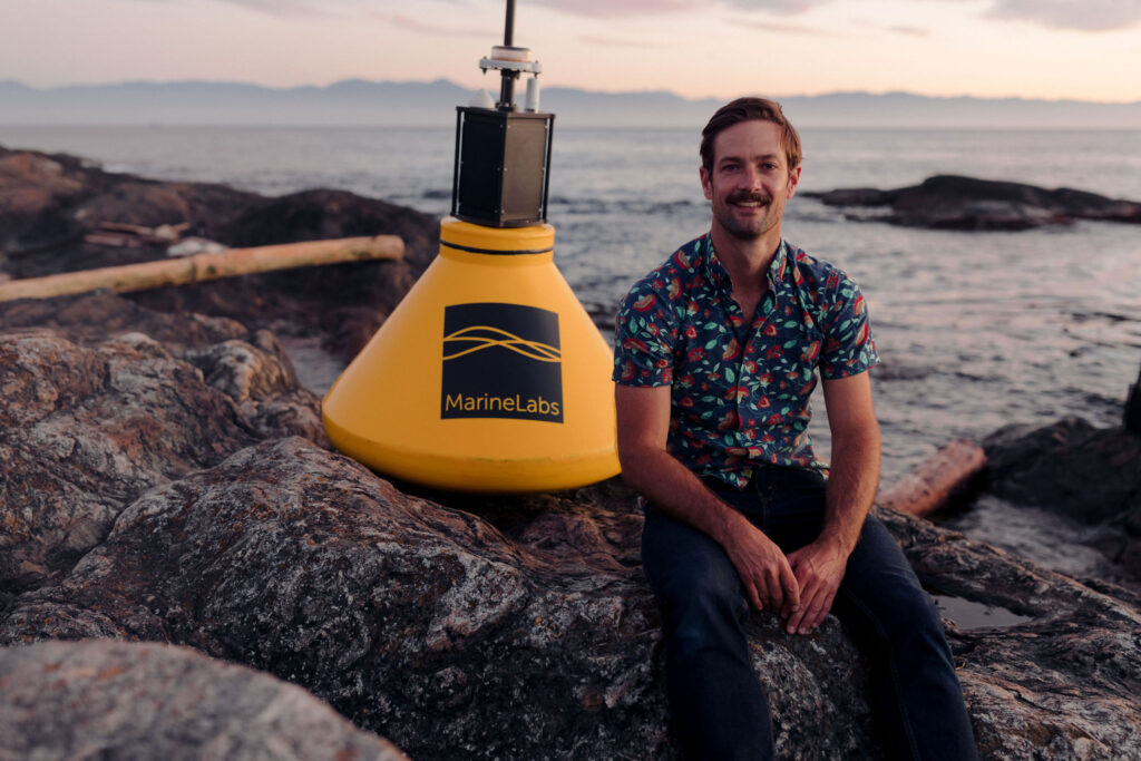 MarineLabs Founder and CEO Dr. Scott Beatty with MarineLabs sensor buoy.