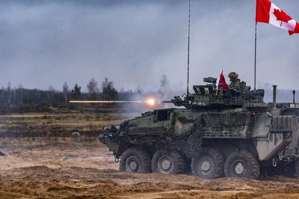 Canadian Armed Forces members in a Light Armored Vehicle 6.0 of NATO’s enhanced Forward Presence Battle Group Latvia fire a 25mm cannon during Exercise IRON SPEAR 2023 II at Camp Ādaži, Latvia on 13 November 2023. Photo: Captain Joffray Provencher, eFP BG Latvia Public Affairs and Imagery Section, Canadian Armed Forces Photo