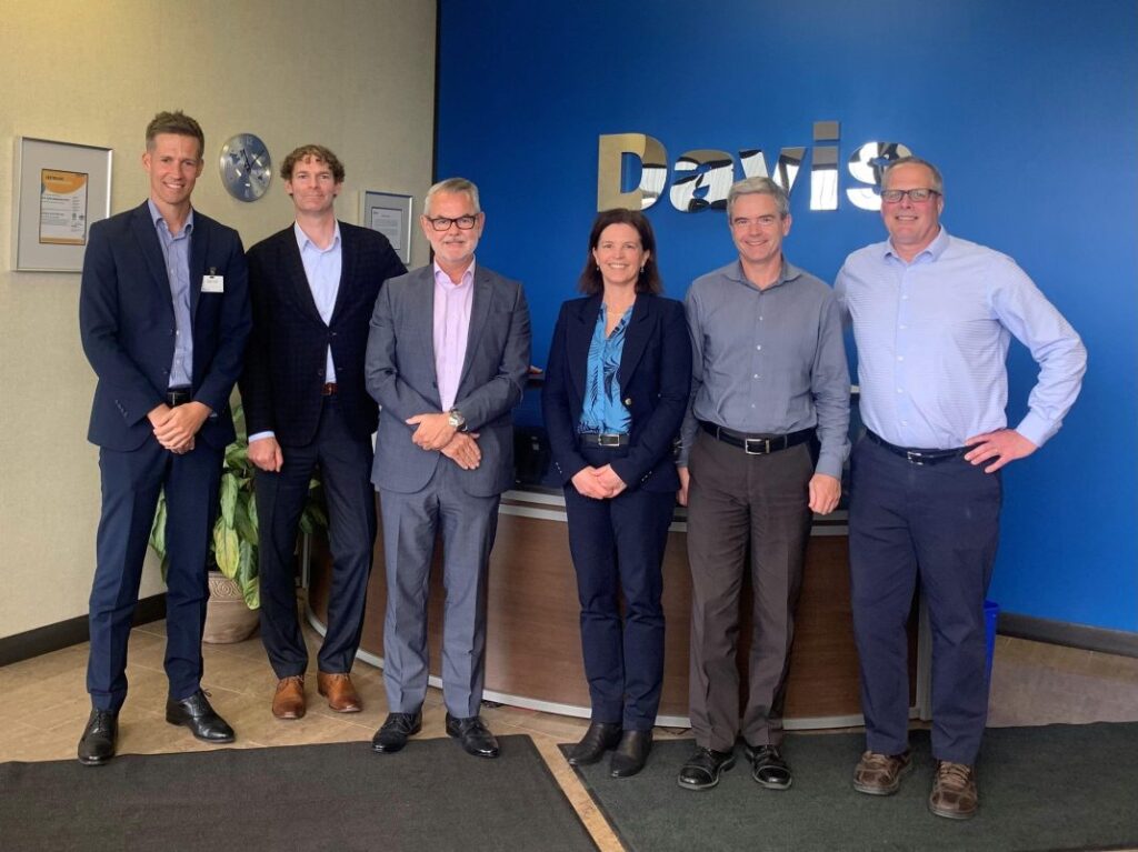 Left to right: Richard Upton (Senior Director, Supply Chain, Irving Shipbuilding); Aaron Plamondon (Director, ITB, Irving Shipbuilding); Lee Fromson (Vice President, Supply Chain, Irving Shipbuilding); Courtney Wagner (Vice President, W.R. Davis); Tom Davis (President, W.R. Davis); Doug VanDam (Director, Mechanical Engineering, W.R. Davis). Image source: https://shipsforcanada.ca/our-stories/ottawas-w-r-davis-engineering-awarded-30-million-supply-chain-contract-to-support-the-river-class-destroyer-project-canadian-surface-combatant-for-canadas-navy