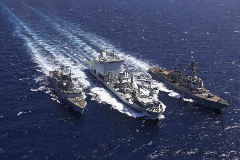 Combat Support Ship Asterix (centre) resupplies US destroyer USS Truxtun and Canadian frigate HMCS Montreal during evacuation efforts offshore Sudan during May 2023. (US Department of Defense). Image source: https://www.hilltimes.com/sponsored/time-to-celebrate-asterix-the-privately-owned-combat-support-ship-putting-canada-back-on-the-charts/