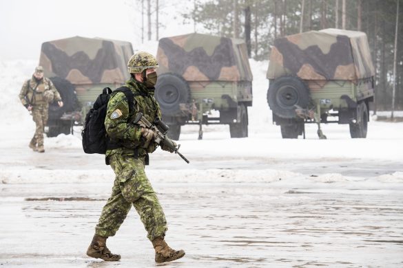 Soldiers with enhanced Forward Presence Battle Group – Latvia prepare their vehicles for a road move on February 24, 2021.