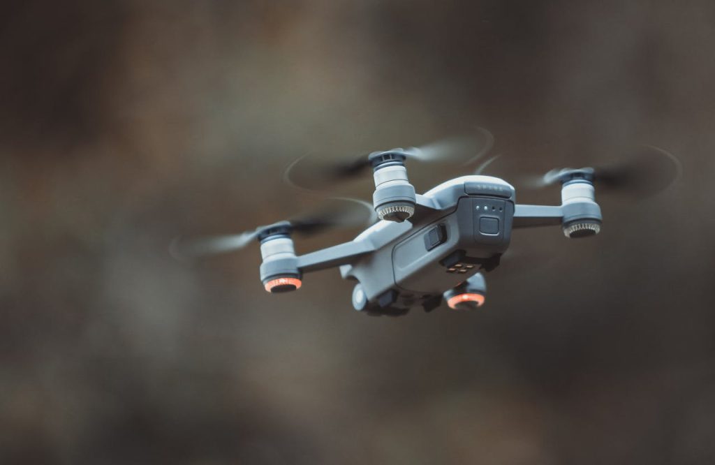 A critical security challenge as drones become increasingly accessible and sophisticated. Image source: https://www.pexels.com/photo/grey-quadcopter-drone-724921/