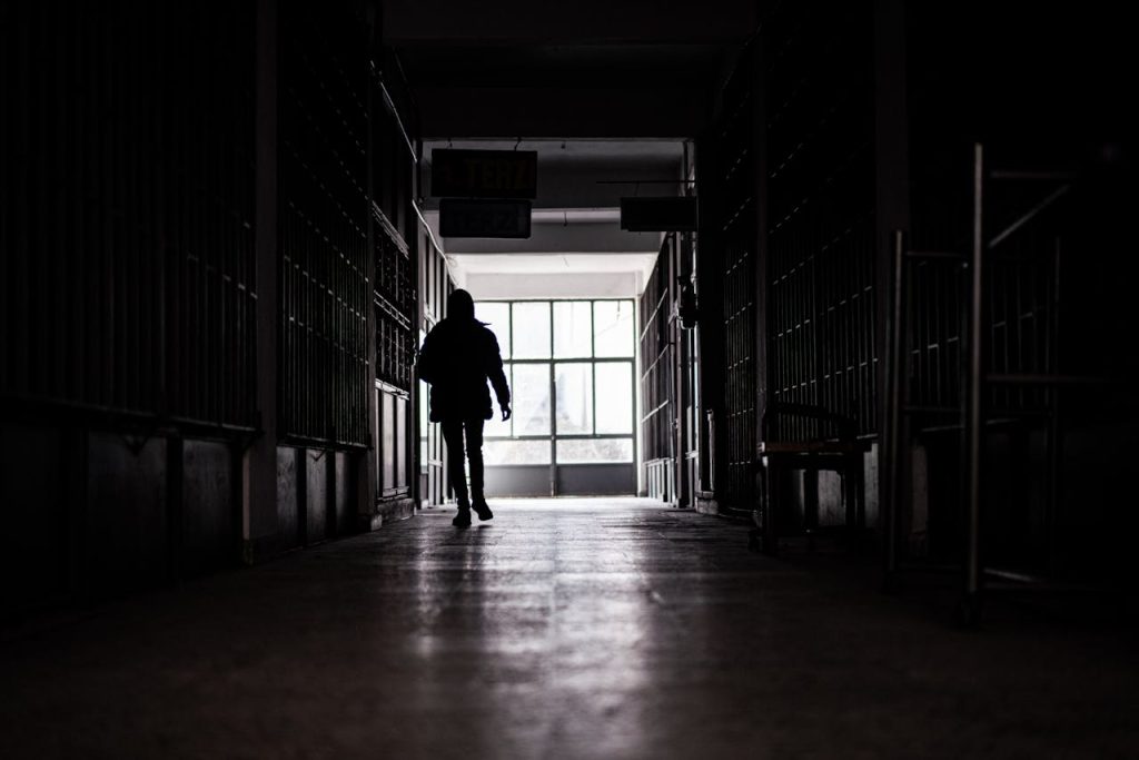 The Canadian threat landscape is constantly evolving. Image source: https://www.pexels.com/photo/silhouette-of-man-in-a-tunnel-in-black-and-white-20629693/
